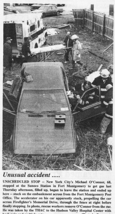 Newspaper clipping showing the scene of a single car accident