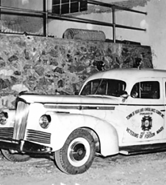 Black and white photo of a 1950s ambulance
